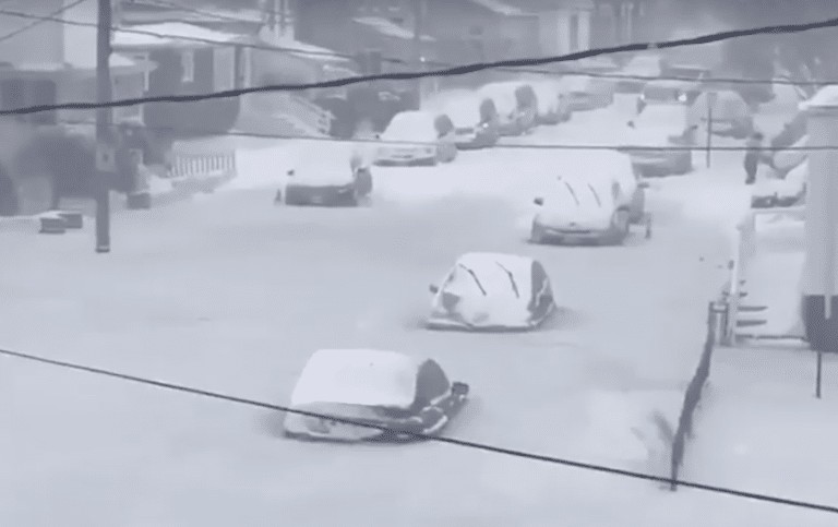 WATCH: Cars frozen in floodwaters after East Coast snow storm